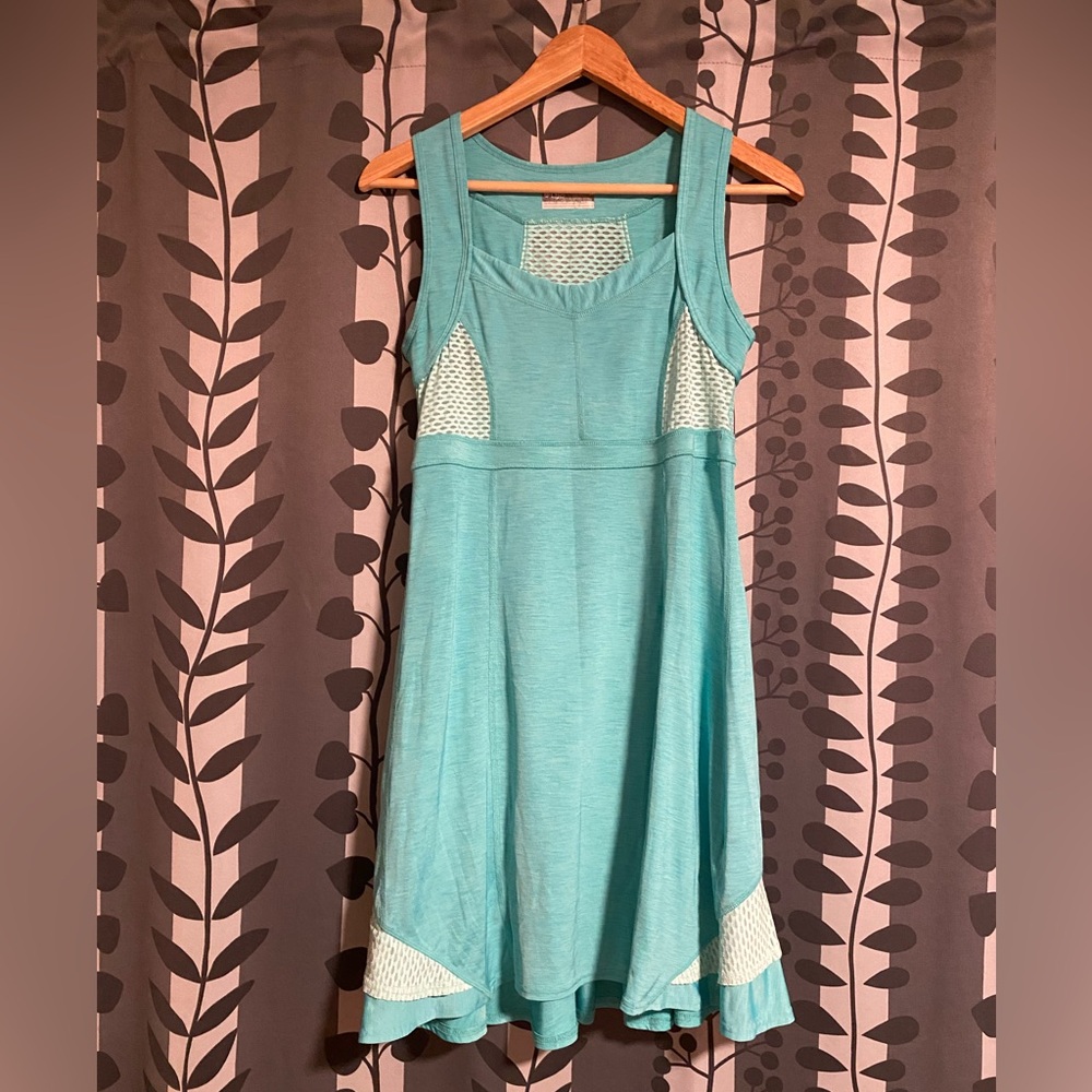 Turquoise Tennis Dress in good condition

Size s/p